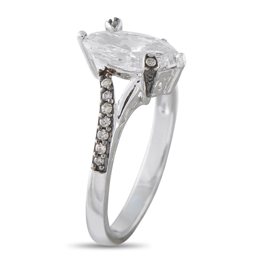 10K white gold diamond ring with marquise-cut center stone and pavé shoulders