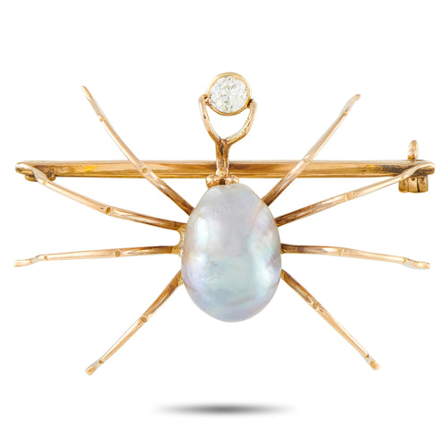 Rose gold-tone spider bar brooch with oval baroque pearl and small round diamond on top