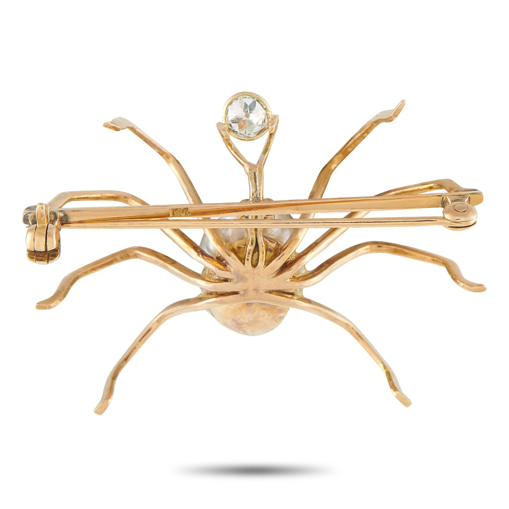 Rose gold-tone spider bar brooch with oval baroque pearl centerpiece and diamond accents