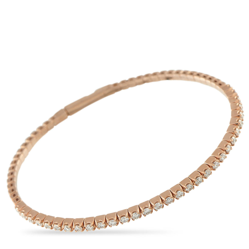Exclusive 14K Rose Gold 1.22ct Diamond Tennis Bangle Bracelet Add sparkle to every attire with this rose gold tennis bangle bracelet that transitions effortlessly from desk to dinner. It 