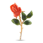 14k rose gold flower brooch with coral bloom, green jade leaves, diamond-studded stem