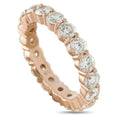 Rose gold diamond eternity band with oval prong-set stones