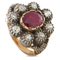 Antique oval ruby ring with diamond halo in silver and rose gold-tone setting