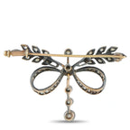 Diamond bow brooch pin with side view, layered loops and small round hanging stones