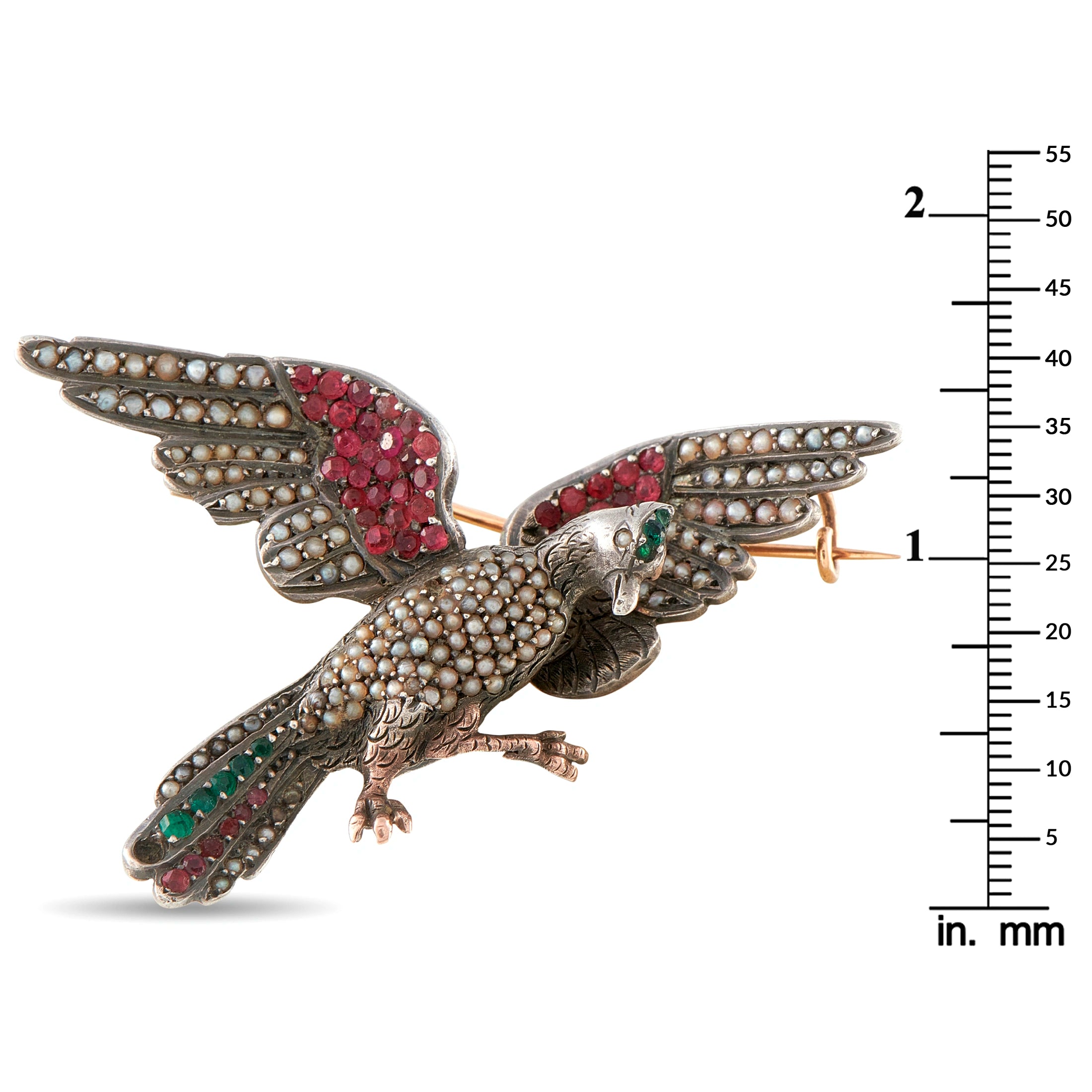 Gold-tone bird brooch with red stone body and green accents on tail