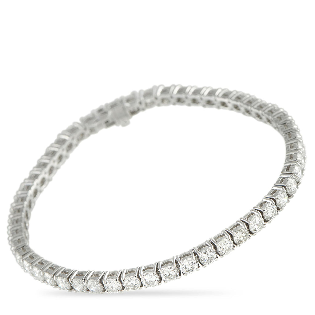 Exclusive 14K White Gold 7.70ct Diamond Tennis Bracelet Set with 7.70 carats of diamonds, this Exclusive  bracelet gives a full, impressive sparkle that you can instantly see from a