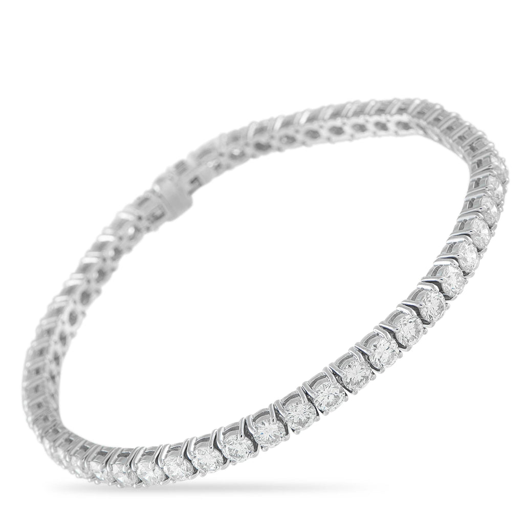 Exclusive 14K White Gold 8.0ct Diamond Tennis Bracelet This classic tennis bracelet is incredibly eye-catching. Set in 14K White Gold, a series of sparkling Diamonds totaling 8.0 c