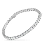Exclusive 14K White Gold 8.0ct Diamond Tennis Bracelet This classic tennis bracelet is incredibly eye-catching. Set in 14K White Gold, a series of sparkling Diamonds totaling 8.0 c