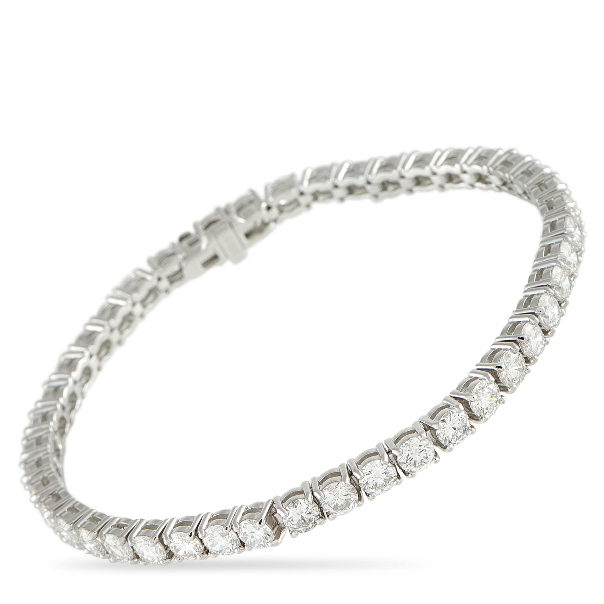 Exclusive 14K White Gold 9.80ct Diamond Tennis Bracelet A white gold bracelet gleaming with 9.80 carats of carefully selected diamonds. This Exclusive  piece showcases a clean, cont
