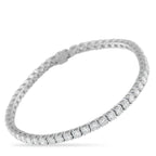 Exclusive 14K White Gold 7.0ct Diamond Tennis Bracelet This classic tennis bracelet is an ideal accessory for anyone who appreciates quiet luxury. Set in 14K White Gold, the simple