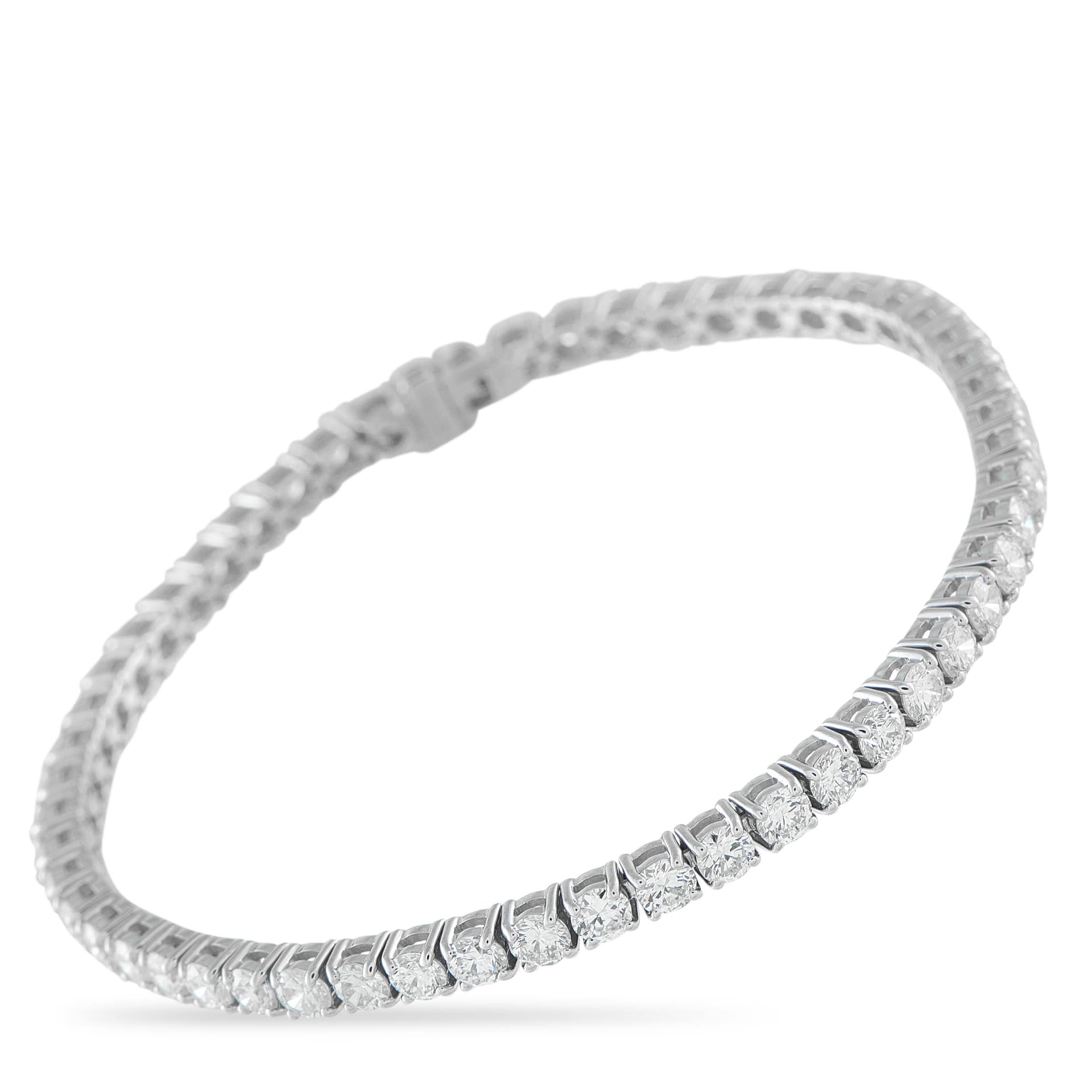 Exclusive 14K White Gold 7.0ct Diamond Tennis Bracelet This classic tennis bracelet is an ideal accessory for anyone who appreciates quiet luxury. Set in 14K White Gold, the simple