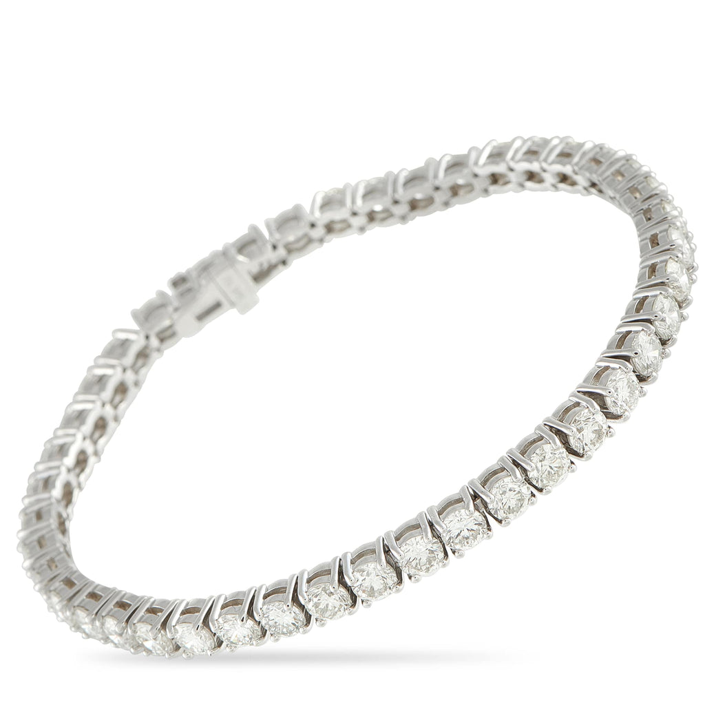 Exclusive 14K White Gold 10.50ct Diamond Tennis Bracelet This 14K white gold tennis bracelet showcases an impressive 10.5 carats of diamonds, with each stone matched for fire, clarit