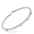 14K white gold diamond woven bangle with round accents and clasp