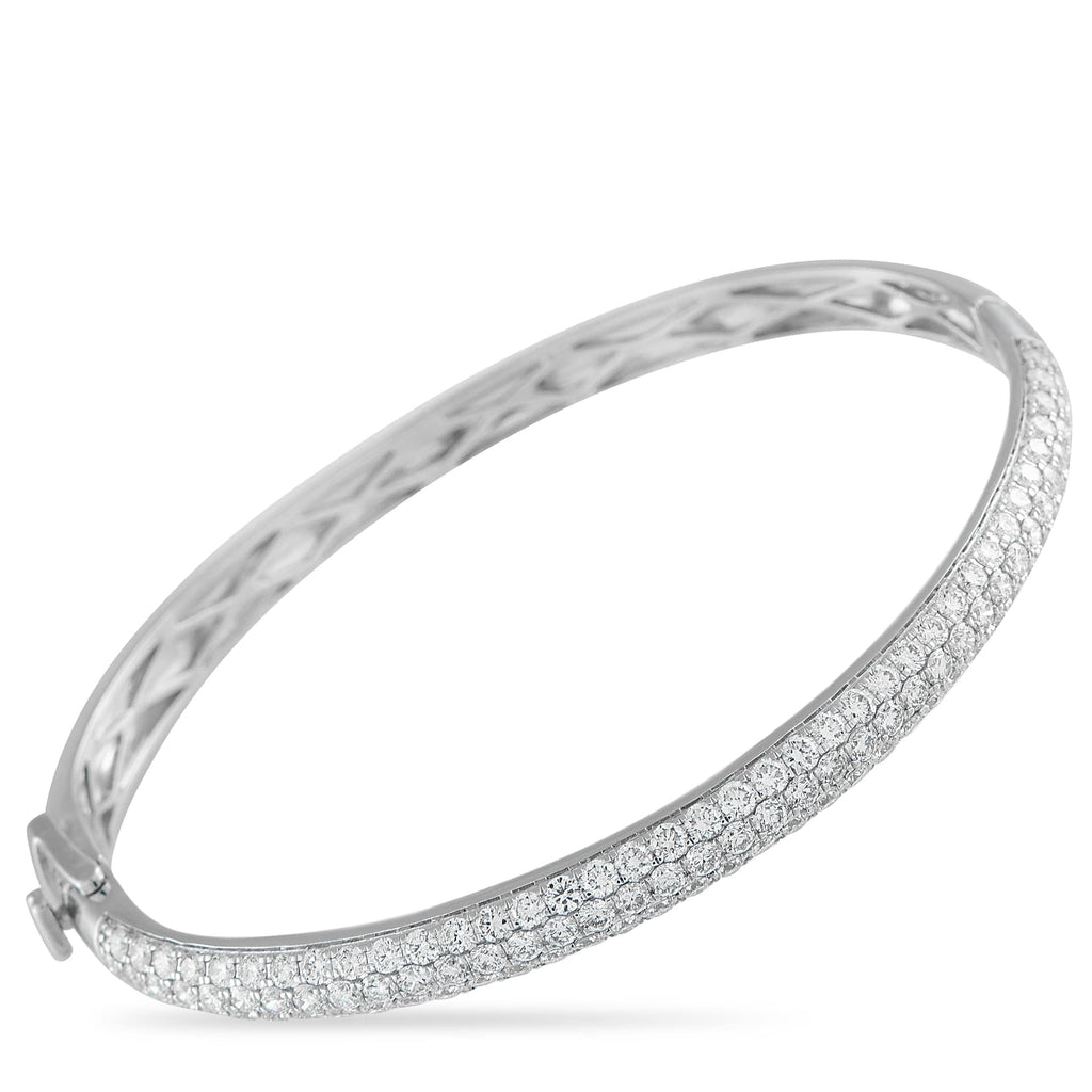 Exclusive 14K White Gold 3.75ct Diamond Pave Bangle Bracelet Expect a bright, icy shine from this Exclusive  bangle adorned with 3.75 carats of pavé diamonds. Set on a white gold base, t