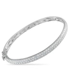 Exclusive 14K White Gold 3.75ct Diamond Pave Bangle Bracelet Expect a bright, icy shine from this Exclusive  bangle adorned with 3.75 carats of pavé diamonds. Set on a white gold base, t