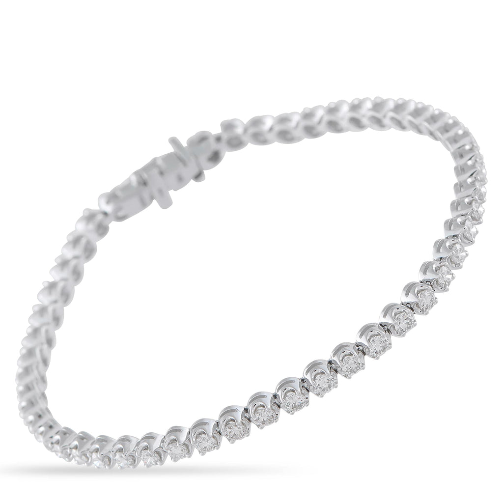 Exclusive 14K White Gold 2.55ct Diamond Tennis Bracelet Day or night, this tennis bracelet adapts to any look. It’s fashioned in 14K white gold and carries a total of 2.55 carats of