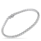 Exclusive 14K White Gold 3.0ct Diamond Tennis Bracelet More than a standard tennis bracelet, this Exclusive  piece boasts an open basket design that allows light to pour in from al