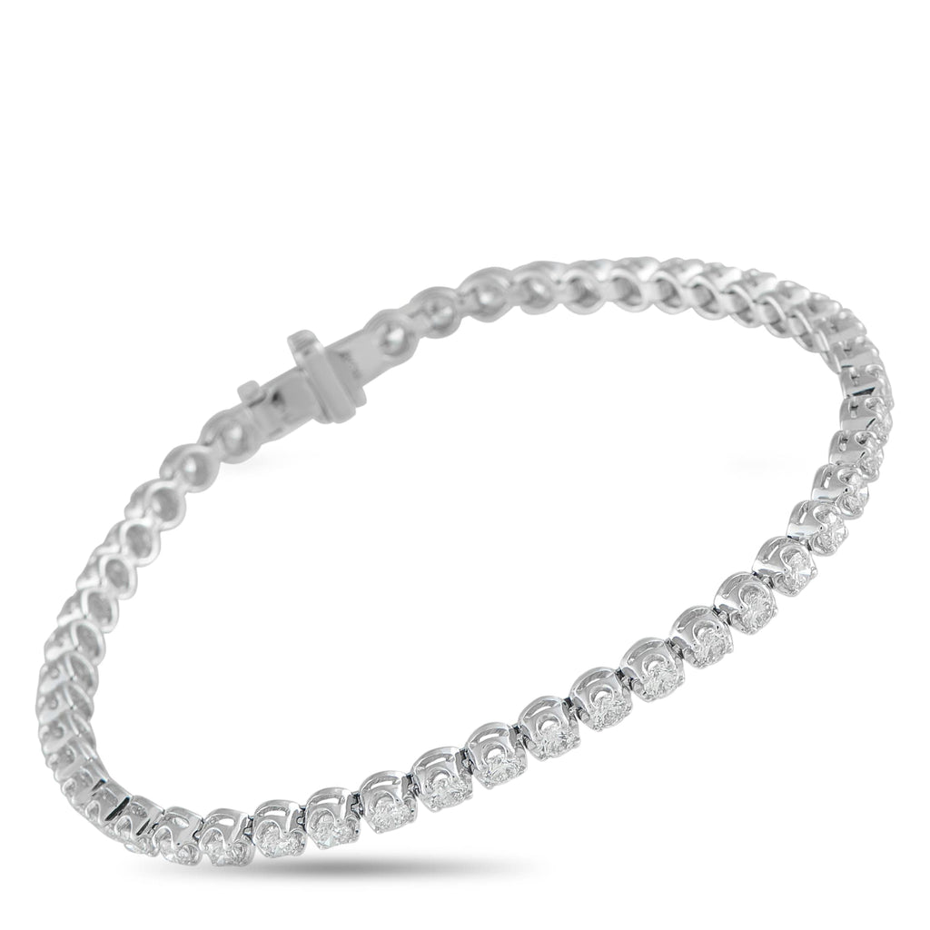 Exclusive 14K White Gold 3.20ct Diamond Bracelet Crafted in 14K white gold, this Exclusive  bracelet features a fluid line of 3.20 carats of diamonds for a look that’s polish