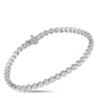 Exclusive 14K White Gold 3.20ct Diamond Bracelet Crafted in 14K white gold, this Exclusive  bracelet features a fluid line of 3.20 carats of diamonds for a look that’s polish