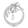 14K white gold diamond brooch with bow-and-drop floral design