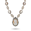 Oval cameo necklace with white gold links, diamond accents, and pearl-like border pendant