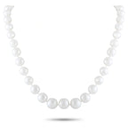 White pearl bead necklace with evenly spaced round pearls, clasp visible at front