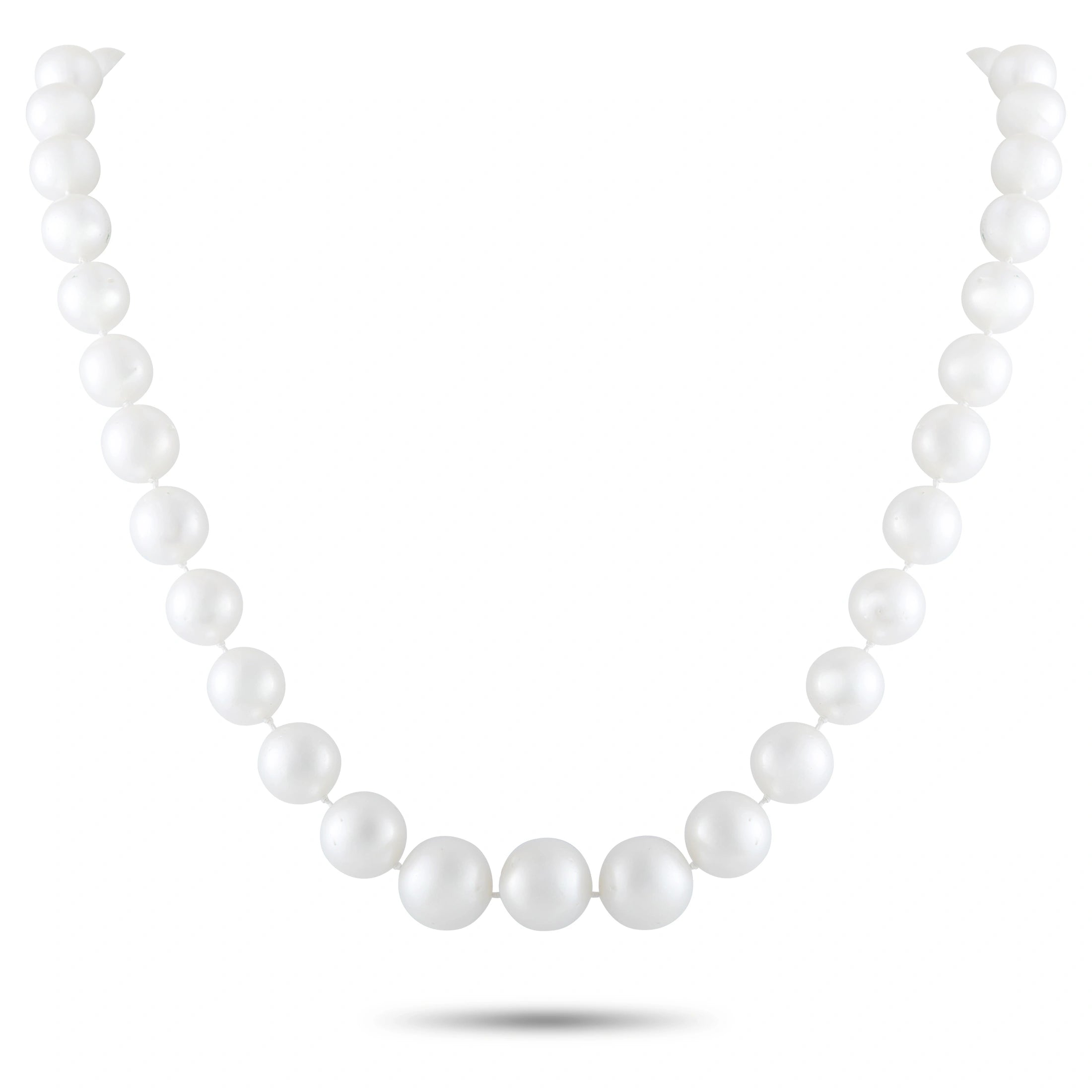 White pearl bead necklace with evenly spaced round pearls, clasp visible at front