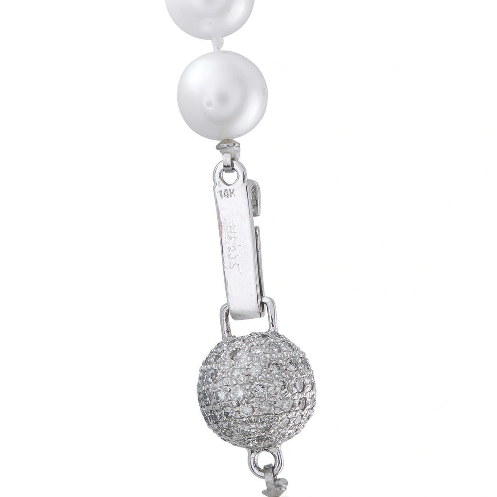 White pearl bead with silver-toned connector and round pave diamond-look pendant