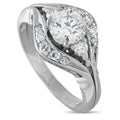 White gold diamond ring with oval center stone and diamond halo