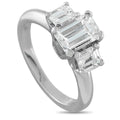 14K white gold three-stone diamond ring with rectangular-cut center stone