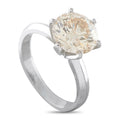 14K white gold solitaire ring with large round diamond, four-prong setting