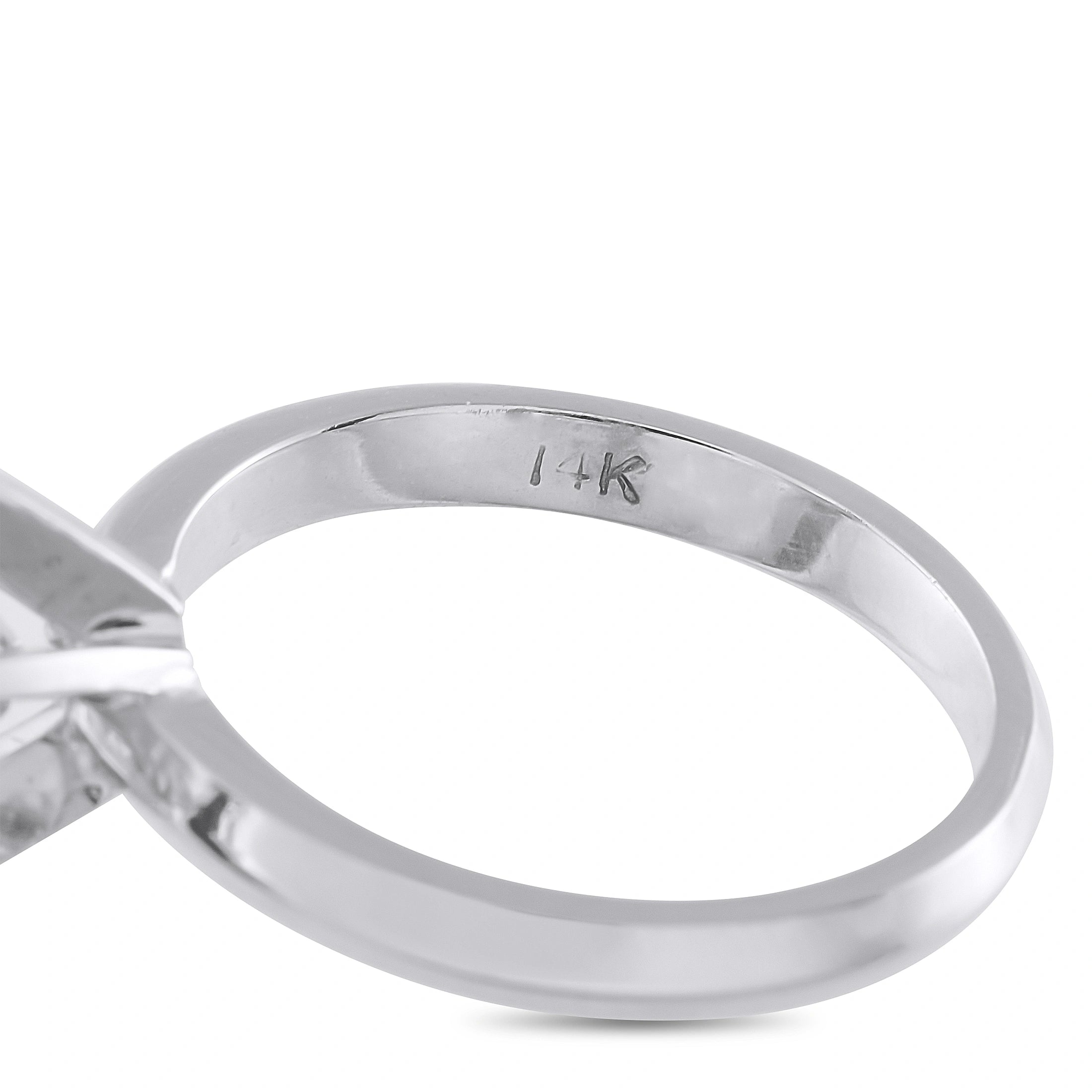 14K white gold ring band interior stamped '14K'