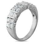 White gold diamond ring with baguette settings and surrounding round stones