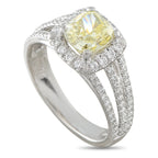 14K white gold diamond ring with yellow center stone and halo side details