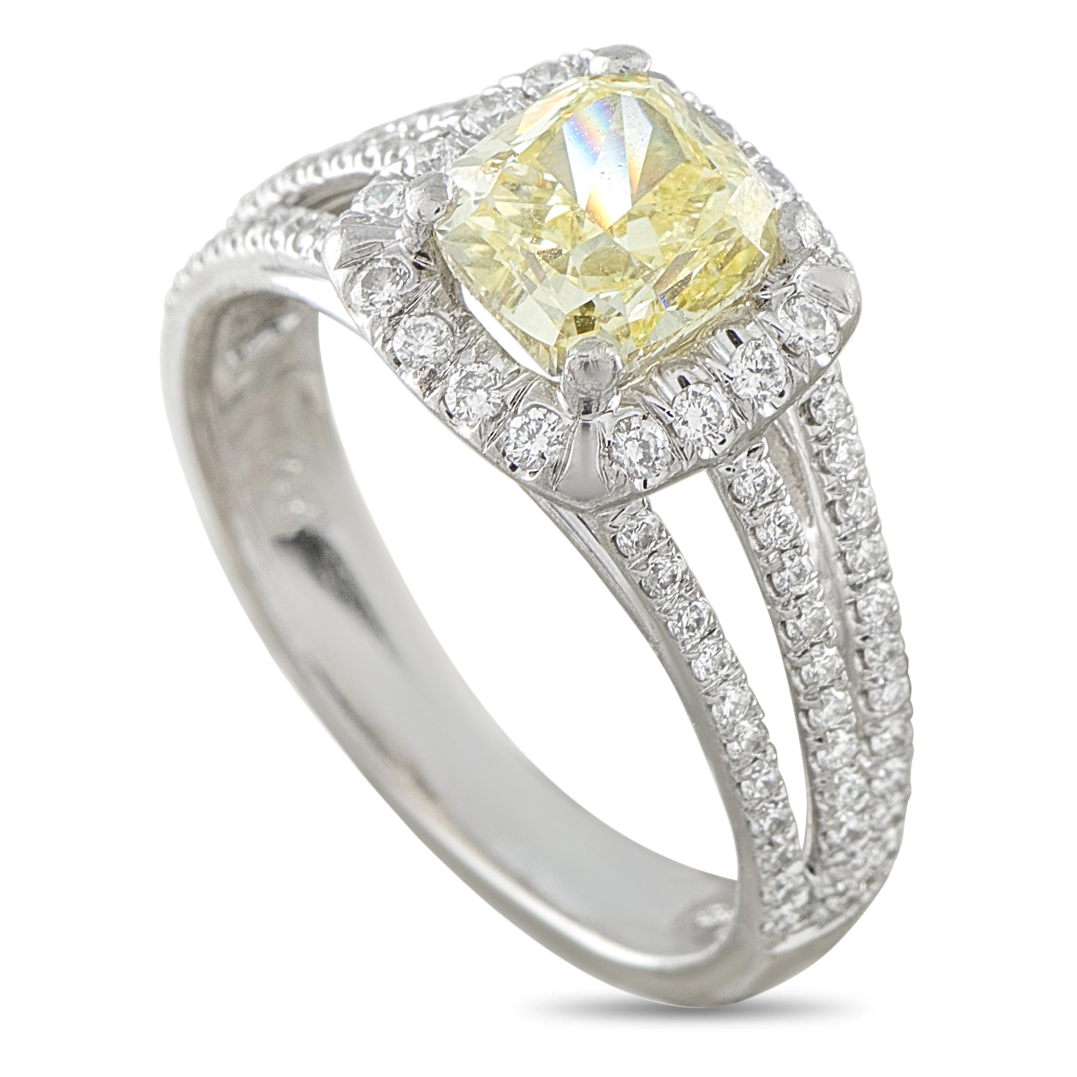 14K white gold diamond ring with yellow center stone and halo side details