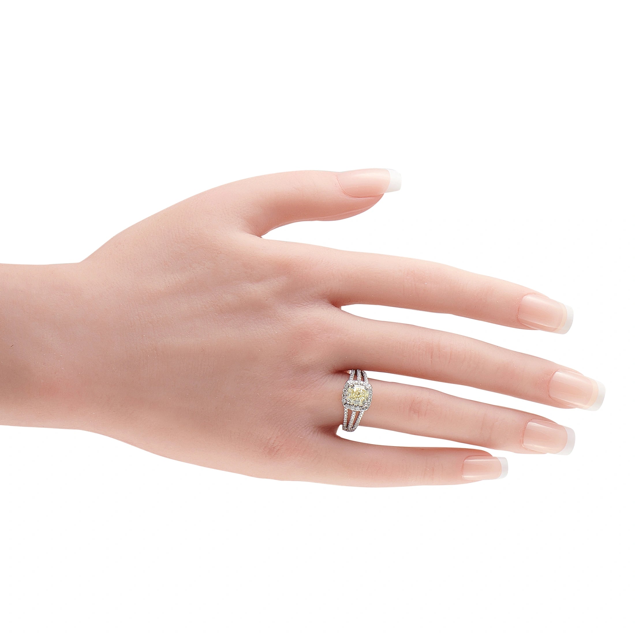 14K white gold diamond ring with yellow center stone on finger