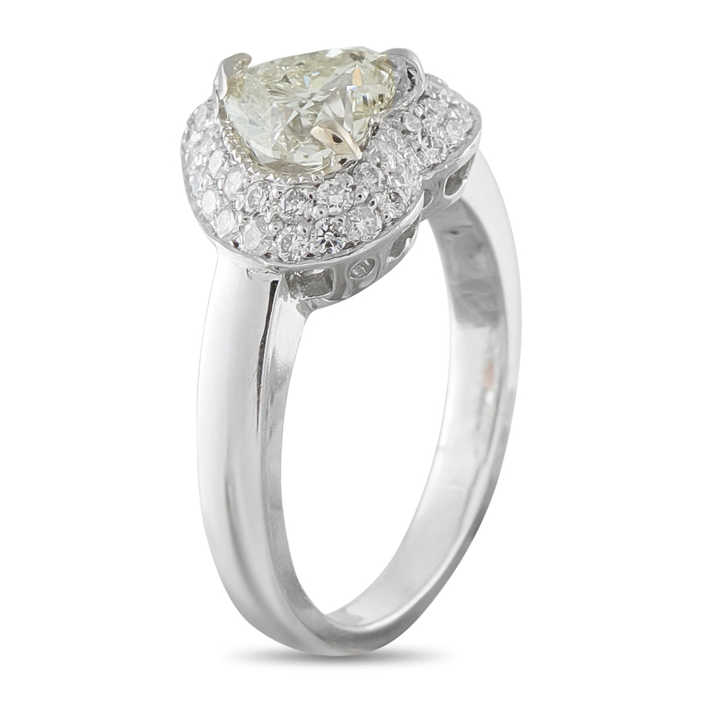 14K white gold diamond ring with pear-cut center stone and halo