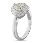 14K white gold diamond ring with pear-cut center stone and halo