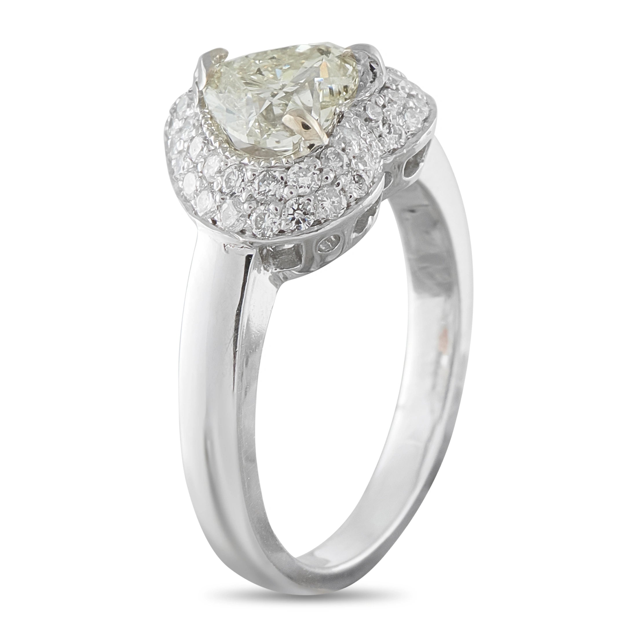 14K white gold diamond ring with pear-cut center stone and halo