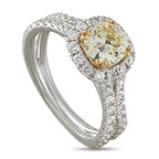 14K white gold halo ring with fancy yellow round diamond