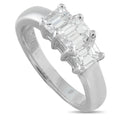 14K white gold three-stone diamond ring with emerald-cut center and side stones