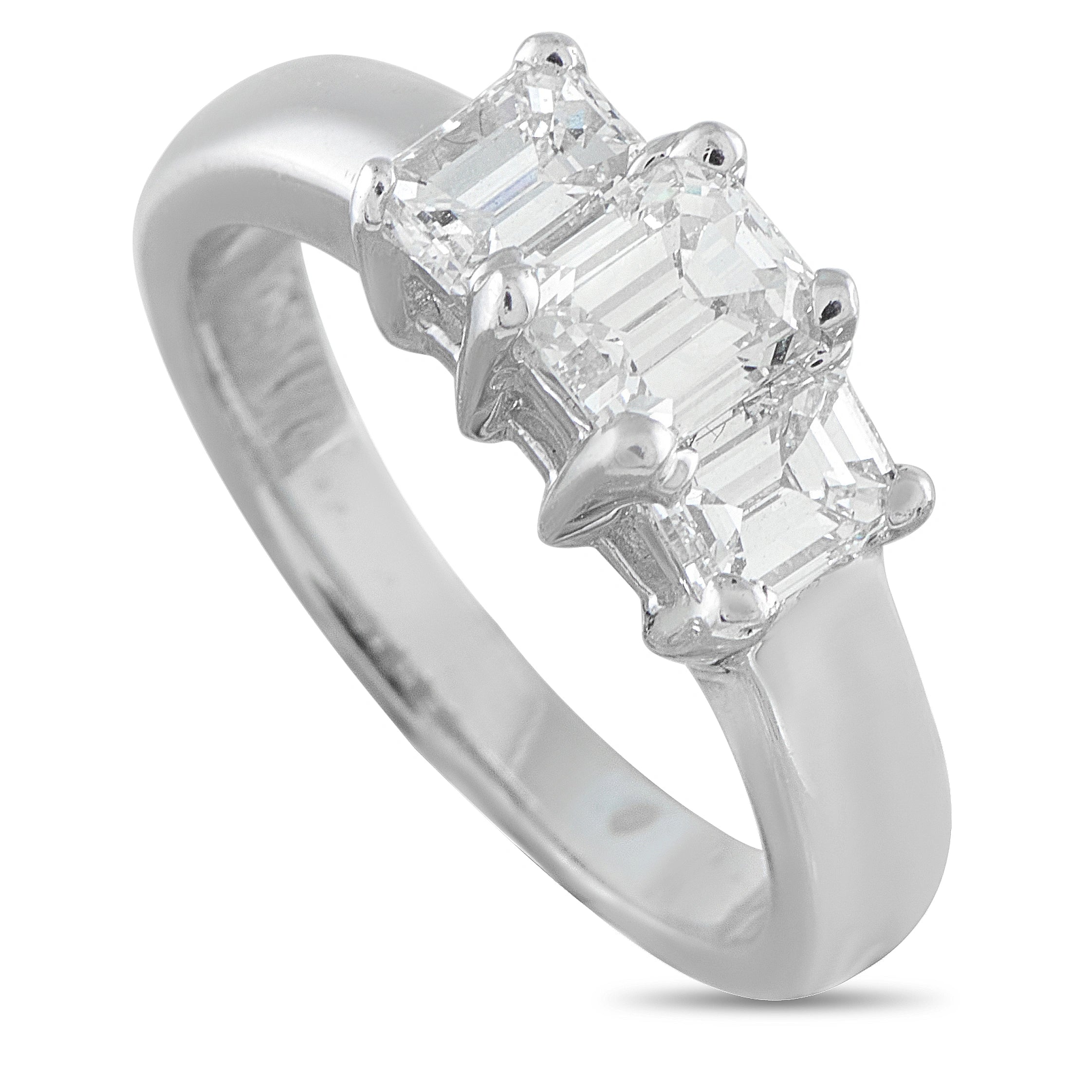 14K white gold three-stone diamond ring with emerald-cut center and side stones