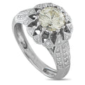 14K white gold diamond halo ring with round center stone and pavé detail