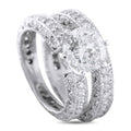 14K white gold diamond ring with large round center stone and pavé band