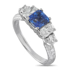 14k white gold ring with blue sapphire center and diamond side stones