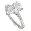 14K white gold ring with oval lab-grown diamond, pear-shaped side stones, pavé band