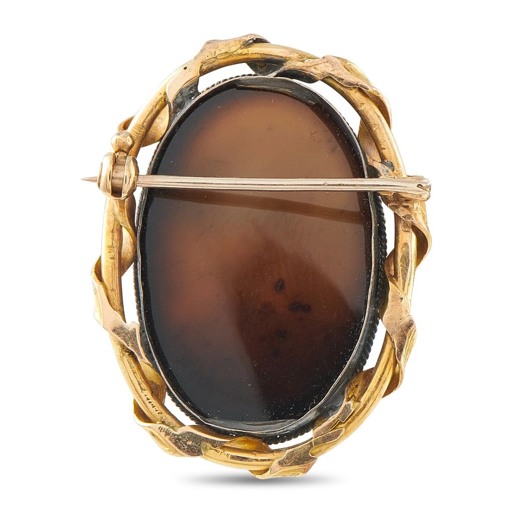 Antique cameo mourning brooch back, dark hardstone oval in ornate yellow gold frame