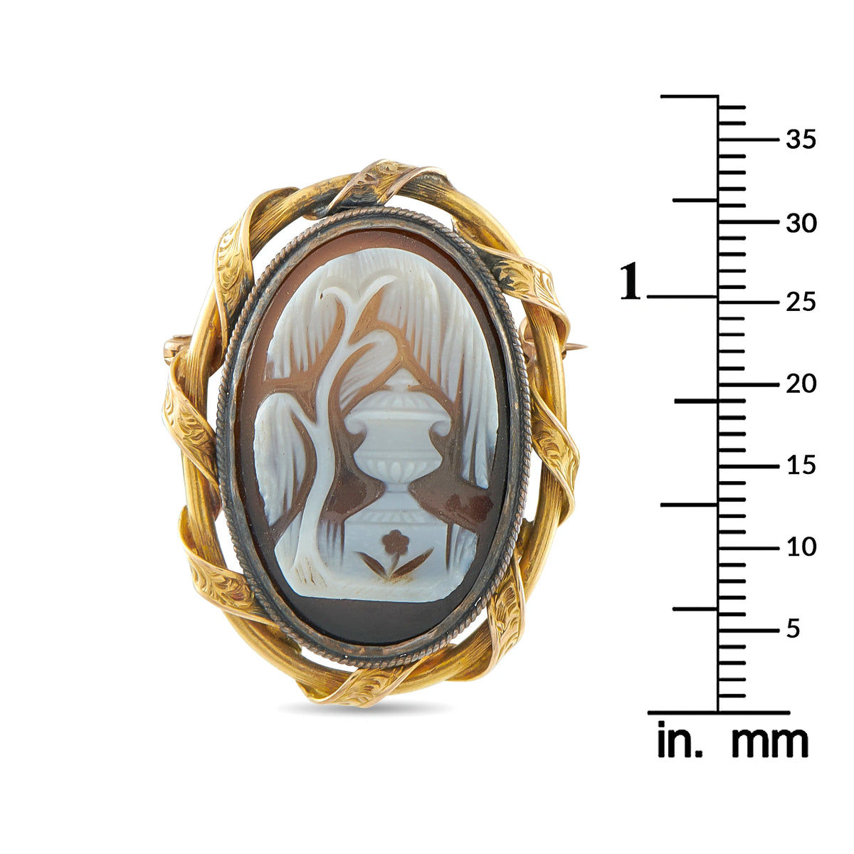 Antique cameo mourning brooch with white-and-brown portrait cameo in yellow gold frame