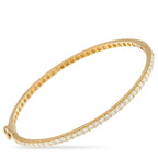 Exclusive 14K Yellow Gold 1.53ct Diamond Bangle Bracelet A sleek 14K yellow gold bangle, set with 1.53 carats of diamonds, perfect for wearing alone or stacking. This Exclusive  piec