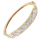 Yellow gold diamond bracelet with oval row of round-cut stones